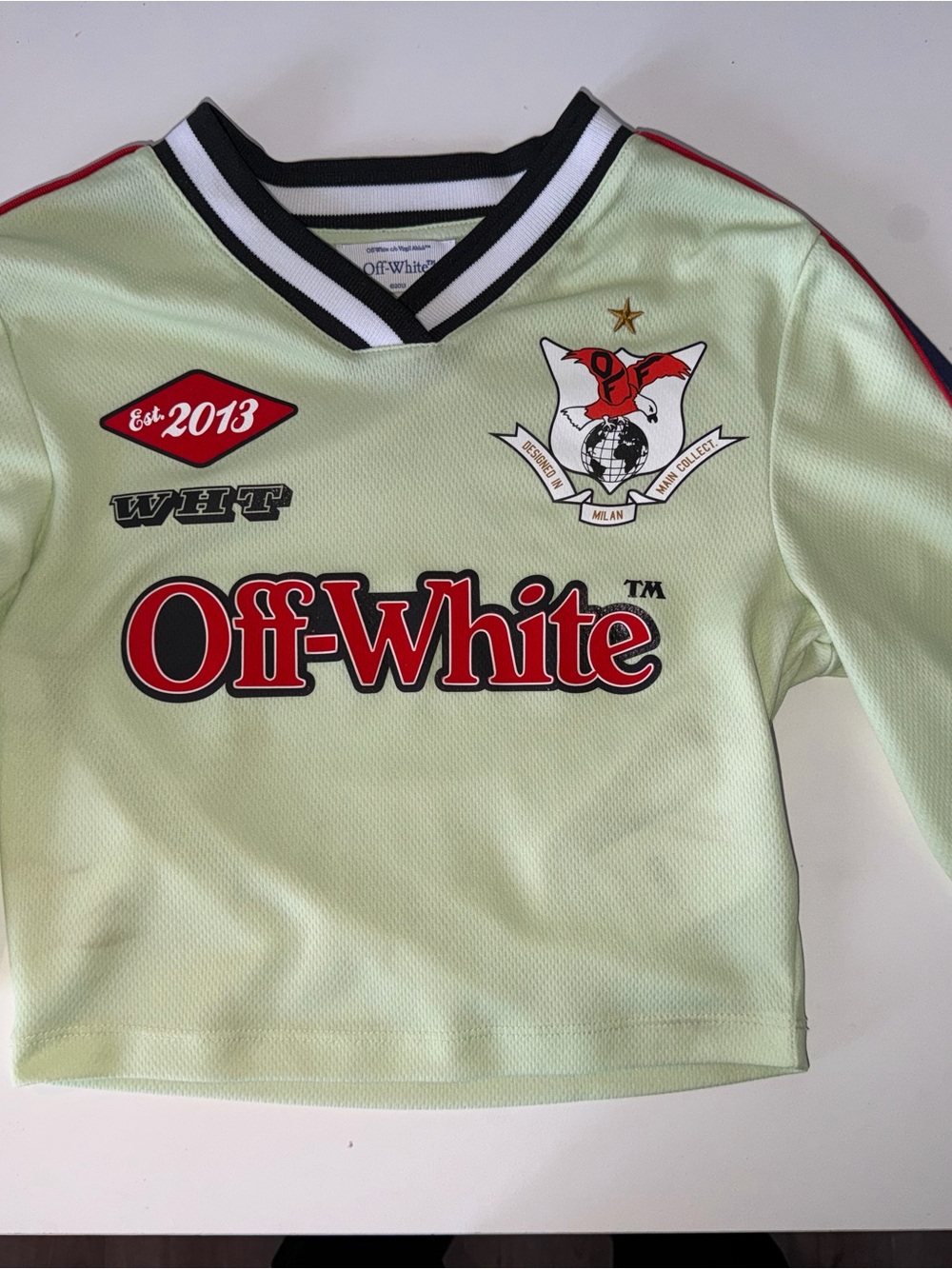 Off-White Kids Light Green Football-Style Logo Top with Red Accents